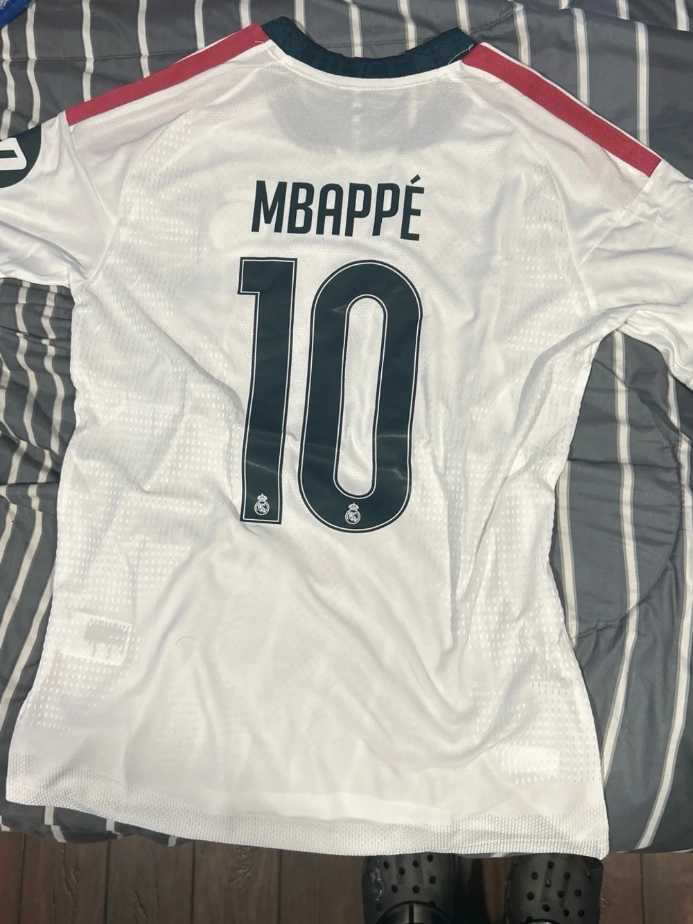 Real Madrid men’s White Home Jersey with pink Shoulder Stripes